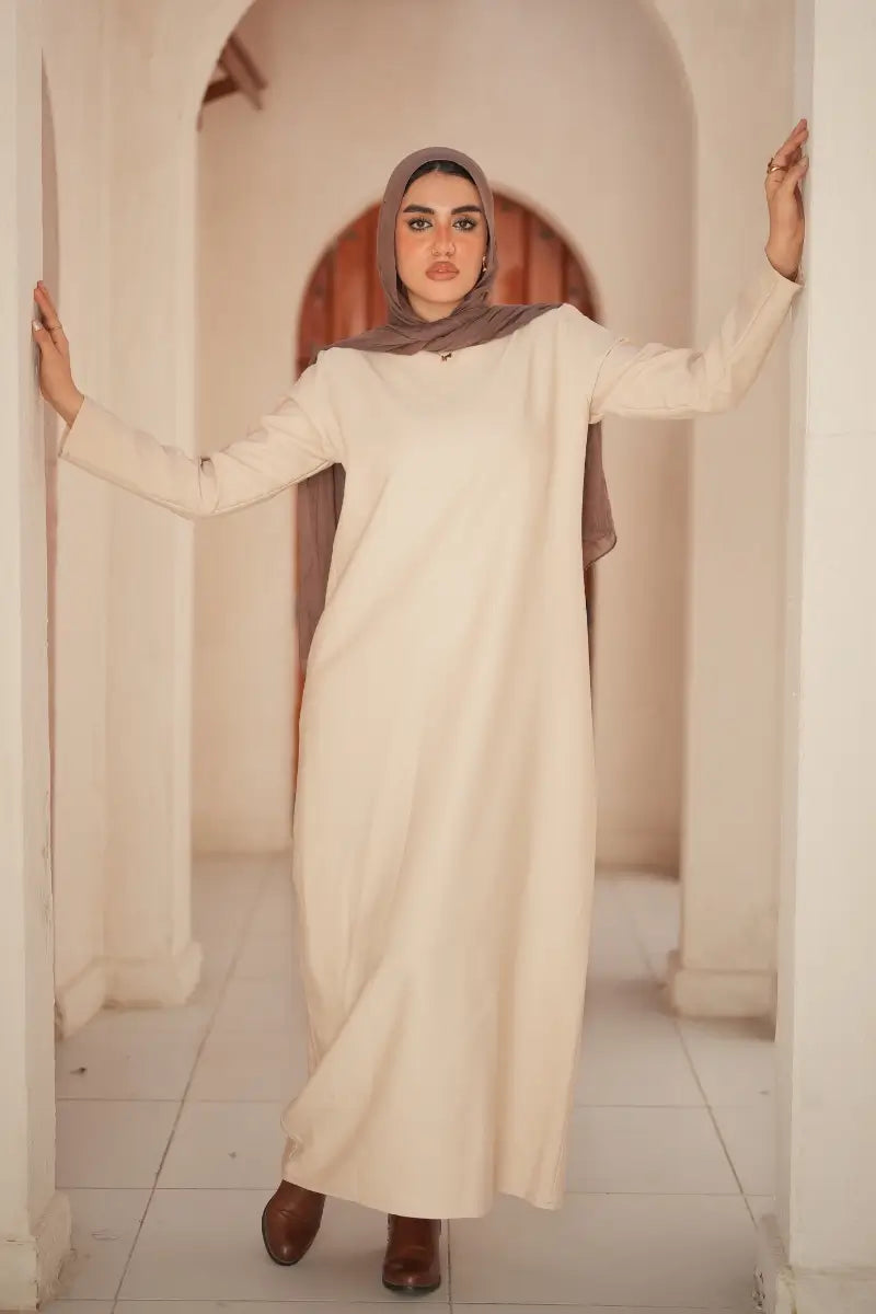 Elegant long-sleeve Beige dress made from Roselyn fabric – perfect for casual and formal wear