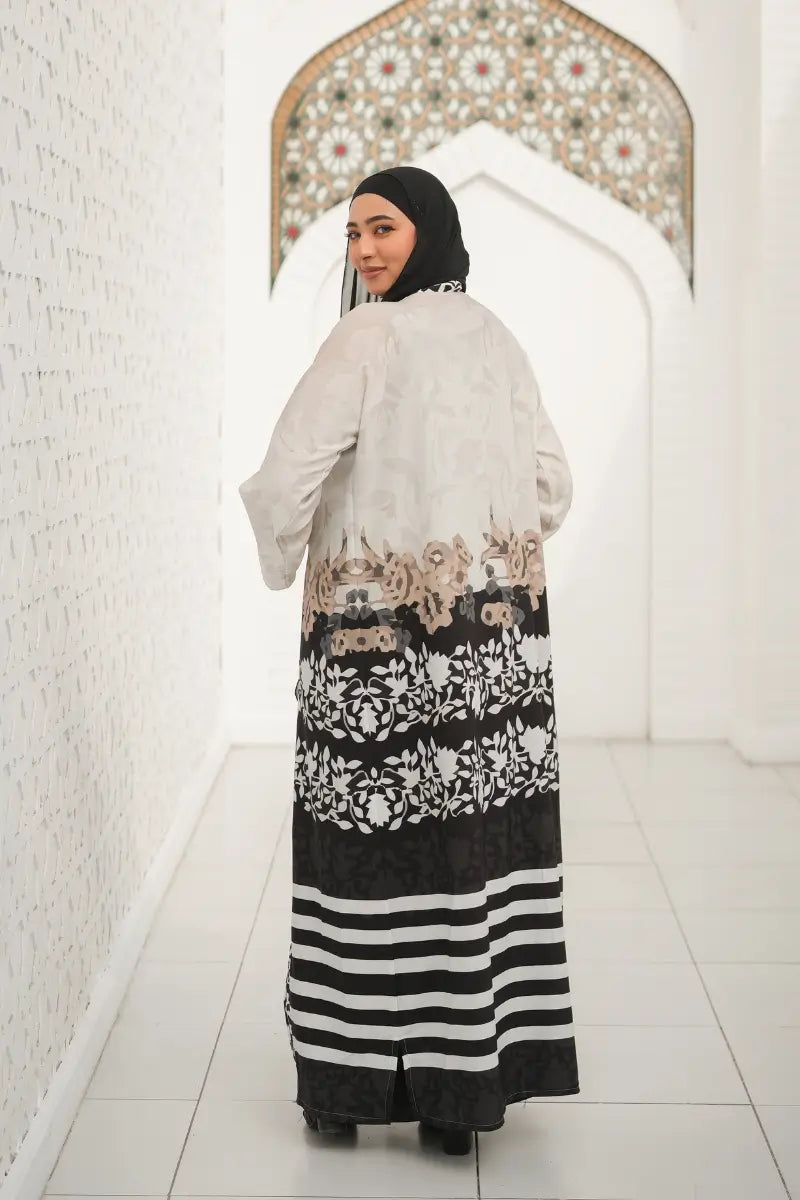 Back view of the Elegant Floral Printed Abaya, showcasing its flawless fit and premium silk and cotton blend fabric.