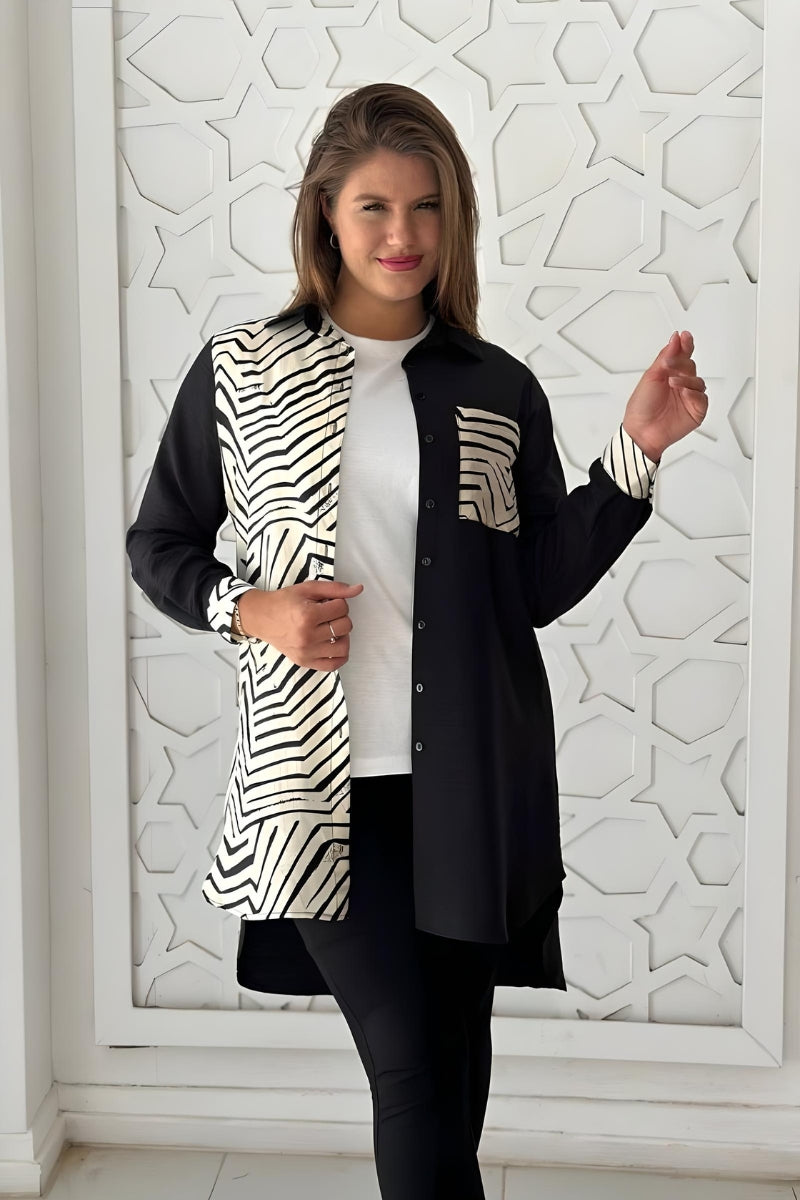 Front view of a black and white button-up long sleeve blouse with a geometric print in rayon slub fabric.