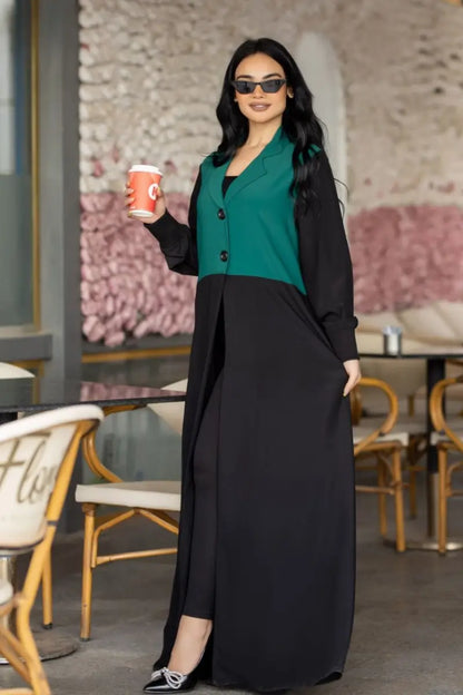 Chic two-tone abaya made from SPH fabric with a green blazer-style bodice and black flowing skirt, open design.