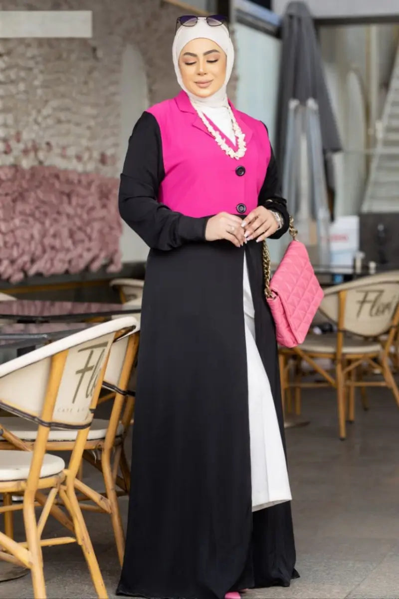 Chic two-tone abaya made from SPH fabric with a pink blazer-style bodice and black flowing skirt, open design.